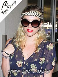  Kesha wearing sunglasses Prada 27NS