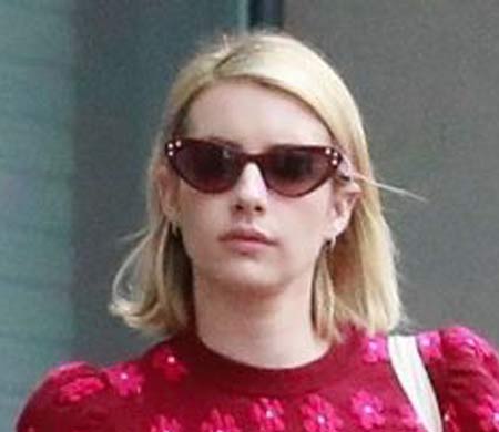 Emma Roberts wearing Miu Miu sunglasses                                                                                                                                                                                                                    — MIU-MIU
