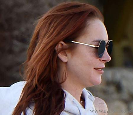 Linsay Lohan wearing Fendi sunglasses at Mykonos                                                                                                                                                                                                           — FENDI